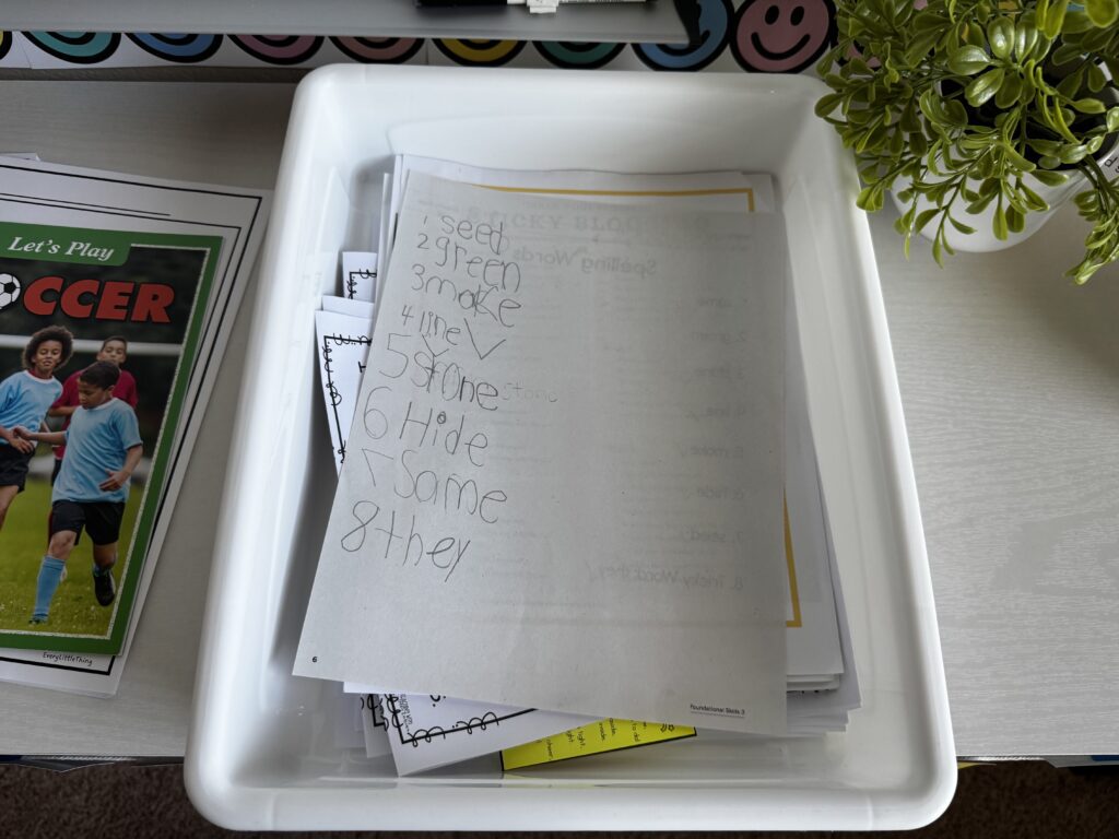 turn in tray with lots of papers