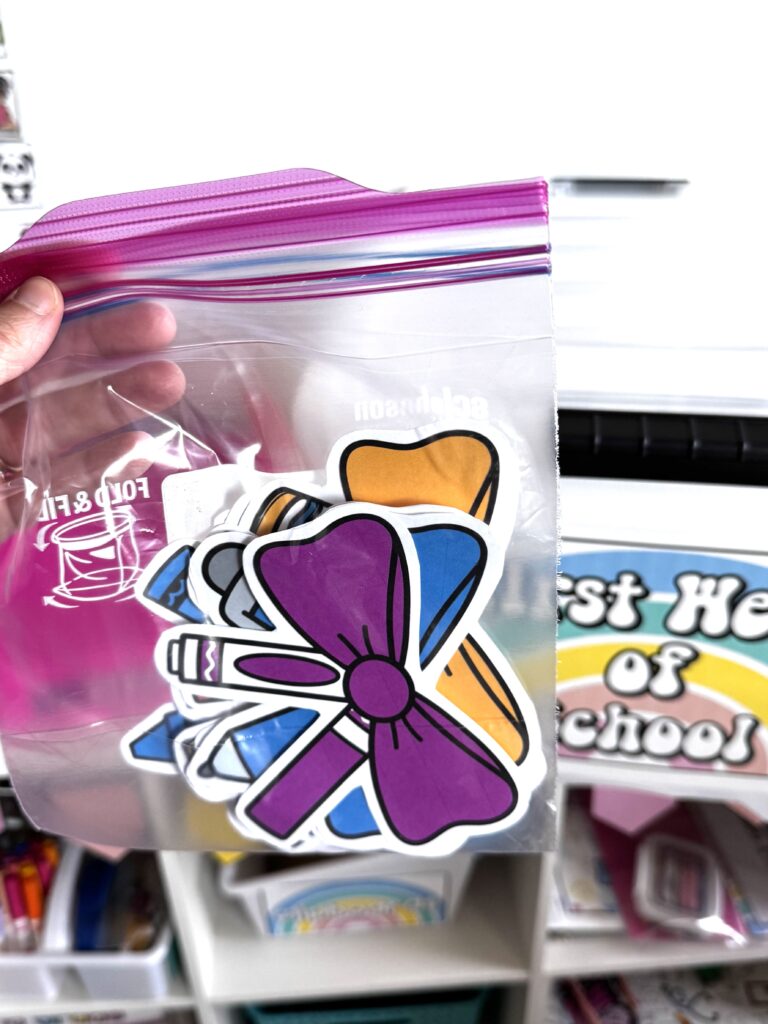 a bag of school supply bows for a bulletin board