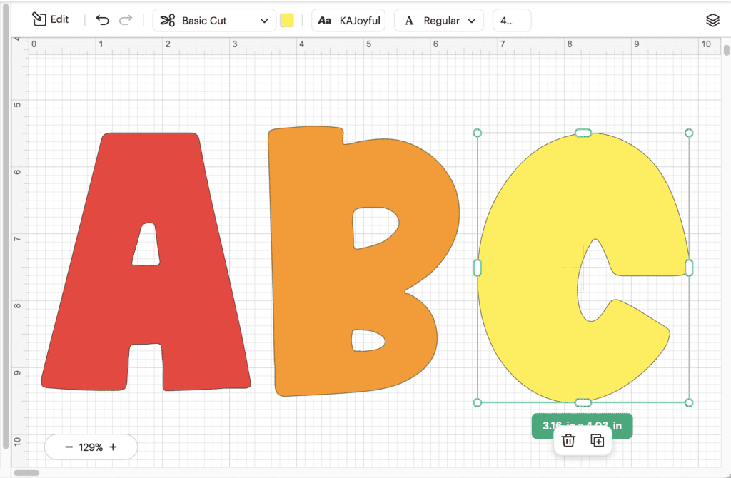 Bulletin board letters with Cricut software is showing the letters ABC using the font KAJoyful