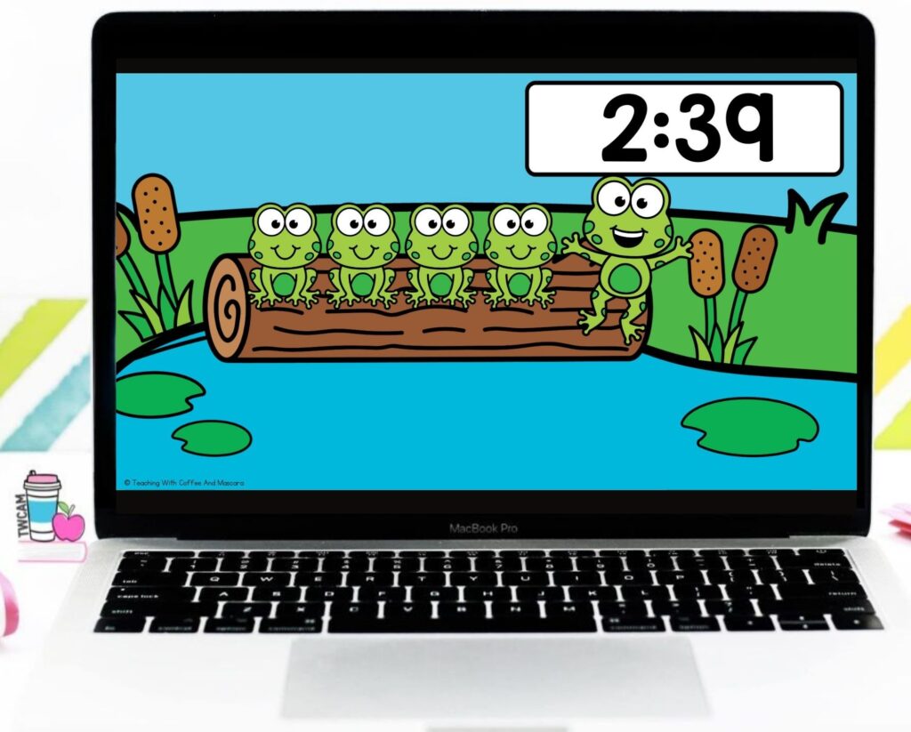 a computer with 4 frogs sitting on a log and 1 frog jumping in the air with the time of 2:39 counting down