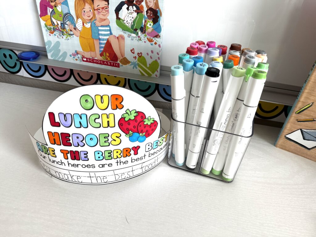 a crown that says our lunch heroes are the best next to Ohuhu markers that's an Amazon teacher find