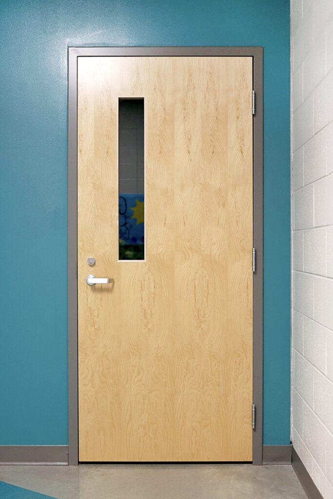 a closed classroom door to help teachers leave at contract time